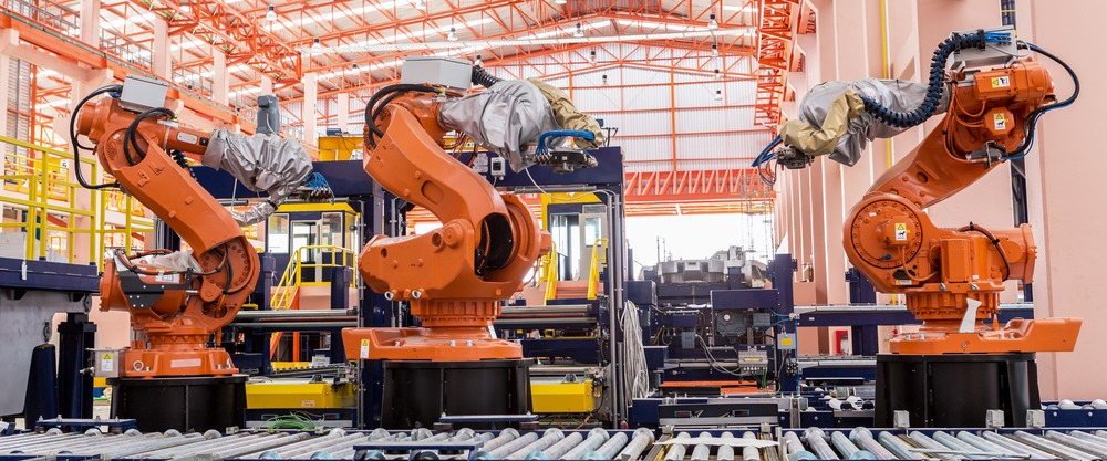 Tân trang Robot công nghiệp: Quy trình chuẩn & Giải pháp tiết kiệm cho doanh nghiệp 5 canh tay robot trong day chuyen san
